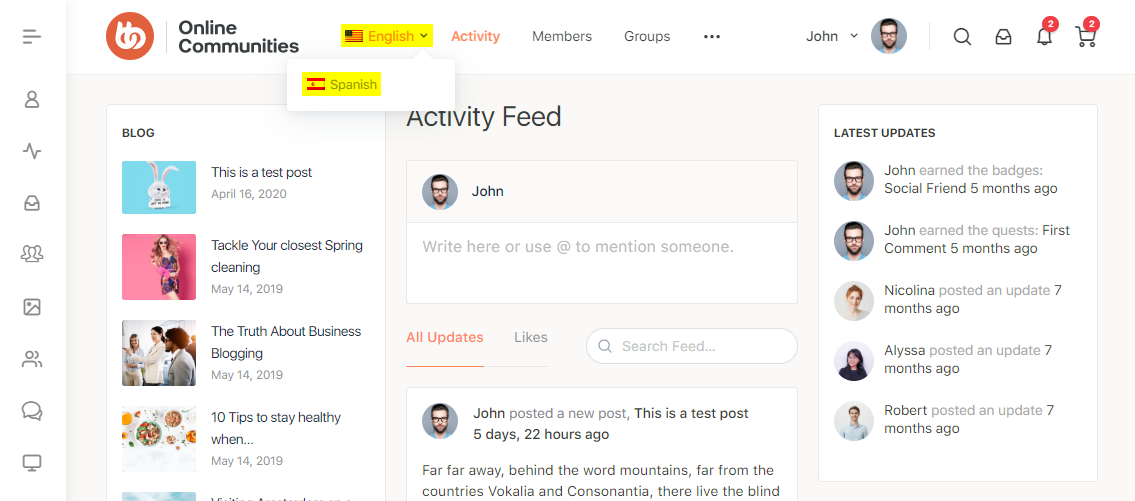 Website dashboard for Online Communities showing an activity feed, recent blog posts, user updates, and a language dropdown with English and Spanish options. User profile and notification icons are visible at the top right.