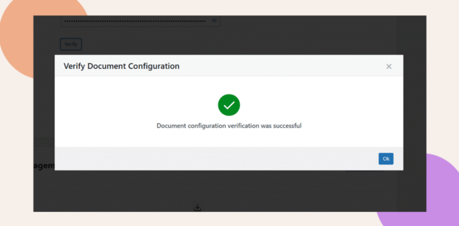 A pop-up window displays the message Verify Document Configuration. Document configuration verification was successful with a green check mark icon and an Ok button at the bottom right.